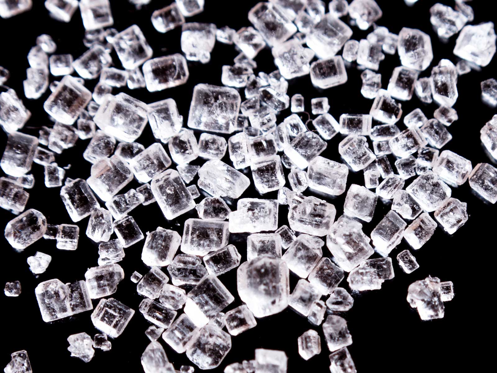 Square crystals on black background