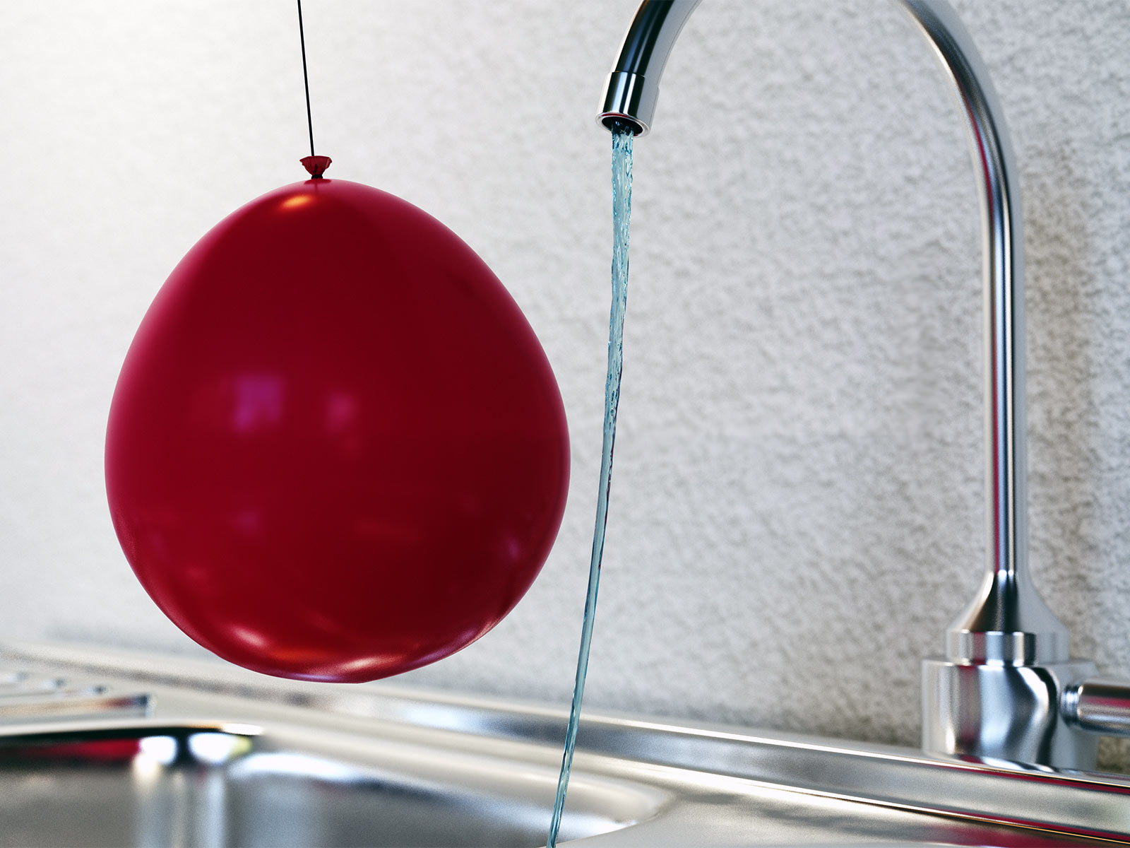 Water bending around balloon